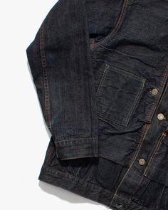 Carefully selected and imported from Japan, each vintage selvedge denim jacket develops its own individual characteristics from years of unique fading and wear. Kiriko's collection of vintage jeans is sourced from Japan's finest manufacturers and mills to showcase the variety of premium denim brands the nation has to offer. Material: 100% Cotton Made in Japan Hidden Body Pockets for added insulation or secret storage Extra-thick Red Selvedge ID Back Cinch Custom Sugar Cane Copper Buttons Levi's Vintage Indigo Outerwear Pre-washed, Dark Wash Selvedge Outerwear For Streetwear, Long Sleeve Dark Wash Selvedge Outerwear, Vintage Indigo Denim Jacket For Fall, Vintage Pre-washed Indigo Outerwear, Vintage Indigo Pre-washed Outerwear, Vintage Denim Jacket With Double-needle Stitching For Fall, Vintage Selvedge Denim Jacket For Fall, Vintage Dark Wash Selvedge Denim Jacket