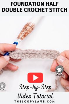 someone crocheting the foundation half of a double crochet stitch with two hands