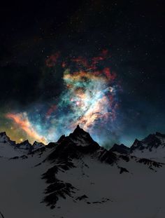 an image of the sky with mountains and stars in the background as well as some clouds