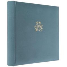 a blue book with a gold emblem on the cover