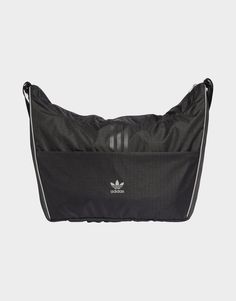 Practical and stylish. This adidas shopper bag has a spacious main compartment and front zip pocket that provide plenty of room for your essentials. Made from a master mix of ripstop and metallic mesh, it features reflective details to stand out from the crowd. This product is made with at least 50% recycled materials. By reusing materials that have already been created, adidas help to reduce waste and our reliance on finite resources and reduce the footprint of the products adidas make.• Dimensions: 12 cm x 50 cm x 39 cm• Volume: 21.5 L• 100% polyester (recycled)• Zip main compartment• Front zip pocket• Reflective details Metallic Mesh, Football Training, Football Kits, Reduce Waste, Football Boots, Jd Sports, Shopper Bag, Adidas Nike, Shoe Care