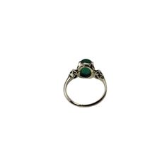 Vintage 14 Karat White Gold Emerald and Diamond Ring Size 4.5   This elegant ring features on oval cabochon emerald (8.8 mm x 7.2 mm) and two round brilliant cut diamonds set in classic 14K white gold.  Shank: 1.4 mm.  Emerald weight: 1.71 ct.  Total diamond weight: .12 ct.  Diamond clarity: VS1-VS2  Diamond color: G-H  Ring Size: 4.5  Stamped: 14K  Weight: 2.2 gr./ 1.4 dwt.  JAGi Certificate included.  Very good condition, professionally polished.  Will come packaged in a gift box or pouch (when possible) and will be shipped U.S. Priority Mail Insured. Fine Jewelry Emerald Oval Cabochon Ring, Fine Jewelry Emerald Ring With Oval Cabochon, Emerald Oval Cabochon Ring As A Gift, Emerald Oval Cabochon Ring In Fine Jewelry Style, Elegant Emerald Ring With Oval Cabochon, Fine Jewelry Emerald Oval Cabochon Ring For May Birthstone, Classic Oval Opal Ring With Polished Finish, Elegant Emerald Ring With Cabochon Cut, Elegant Cabochon Emerald Ring