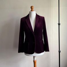 Classic vintage cotton velvet jacket from St Michael, made in the UK, size 12. 80% cotton 20 % modal velvet. Burgundy with burgundy lining. Two button front, two button cuff, unvented back. front patch pockets. Armpit to armpit 18 in 46 cm, sleeve 23 in 58cm, back length 26 in 66cm, shoulders 15 in 38 cm. Good vintage condition, any marks are minimal and can be seen in the photos and video.  For more vintage clothing and accessories, visit my shop https://www.etsy.com/uk/shop/coolclobber Burgundy Velvet, Velvet Jacket, St Michael, Cotton Velvet, Vintage Cotton, Vintage Outfits, Outfit Inspirations, Size 12, Jackets & Coats