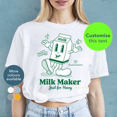 "Looking for a thoughtful gift for a mum or your best friend? Our personalised \"Milk Maker ...\" tee is perfect for baby showers, birthdays, or just because it's Tuesday. Grab your t-shirt today and let your unique mama style shine! PERSONALISATION Choose your text to sit beneath 'Milker Maker' e.g. Fresh from mama, For Emily, Since 2019 Alternatively you can leave this blank for just the 'Milk Maker' design. Please note, you will receive an email to check and complete the personalisation of your t-shirt yourself. What type of mama are you? HOW TO ORDER 1. Chose shirt colour Select from the drop down menu 2. Select shirt size See our size guide for details in the listings images 3. Add personalisation Simply add the text of your choice in the personalisation box and we'll do the rest 4. A Novelty Custom Print T-shirt For Gift, Personalized Funny Tops For Gifts, Funny Personalized Tops For Gifts, White Novelty Tops As Gift, White Novelty Tops For Gifts, White Novelty Tops As A Gift, Funny Name Print Tops For Gifts, Personalized White T-shirt As Gift, Funny T-shirt With Name Print For Gift