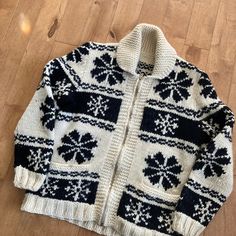 "This piece is a beautiful example of a vintage Cowichan or Siwash style knit sweater from the 1960s. The heavyweight wool Cowichan sweaters originated from British Columbia, Canada and this one can be dated back to the 1960s by its zipper from the Lightning Fastener Company, a former Canadian zipper manufacturer. This handmade sweater has a full zip front, two pockets at the waist and a beautiful black and white design throughout. -Most likely made in Canada -A couple faint stains on the white -Some faint yellowing around collar Tag Size: N/A, fits like an XS *refer to measurements for true fit* Pit to Pit: 19\" Length: 24\" Please also assess the photos and measurements carefully using your own personal judgement as we do not accept returns. Keep in mind that this is a piece of vintage c Cowichan Sweaters, Handmade Cardigan, Cowichan Sweater, Handmade Sweater, Jacquard Pattern, Sweater Vintage, Pattern Sweater, Black And White Design, White Design