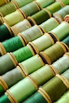 many spools of thread sitting on top of each other