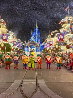 the main street in disney world at christmas time