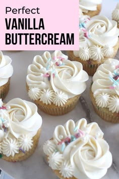 vanilla buttercream cupcakes with white frosting and sprinkles