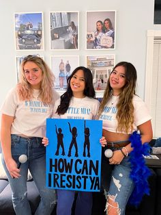 three girls are holding a sign that says how can irestya? in front of them