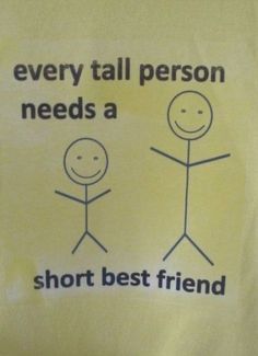 a yellow sign with two stickers saying every tall person needs a short best friend