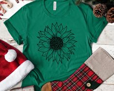 "Sunflower Shirt for Women, Sunflower Tee, Women's Garden Shirt for Summer and Fall, Gift for Her, Vacation Shirt, Mother shirt, flower tee This comfortable T-shirt is a perfect gift idea as a birthday gift, Christmas Present, or any special occasion for your best friends or your family members or anyone who you love and a really great way of putting a smile on their faces. Retail fit 100% Soft cotton (fibre content may vary for different colors) Light fabric (4.2 oz/yd² (142 g/m Tear away label Casual Green Top As Gift, Green Tops With Custom Print For Gift, Custom Print Green Tops For Gifts, Green Custom Print Top For Gift, Green Short Sleeve Shirt For Gift, Green Casual Top, Casual Green Sunflower Print Top, Green Cotton Top With Sunflower Print, Green Cotton Sunflower Print Top