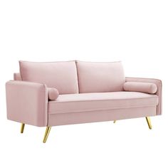 a pink couch with gold legs on a white background