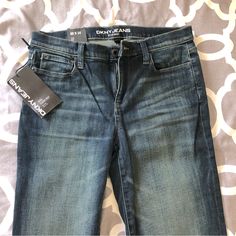 New With Tags Dkny Soho Boot Leg Mid-Rise Denim Jeans! These Classic Jeans Are Perfect For Casual Wear Or Going Out! Size 6. In Perfect Condition With All Original Tags- Never Worn! Stretch Denim Fabrication. Flare Leg. Belt Loops. 4 Pockets. Button/ Zip Fly Closure. Machine Wash. Dkny Boots, Womens Jeans Bootcut, Leg Belt, Dkny Jeans, Black Denim Jeans, Classic Jeans, Boot Cut Denim, Mid Rise Jeans, Dark Wash Jeans