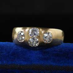 Beautiful Antique Victorian 18K Yellow Gold Old Mine Diamond Four Stone Flush Set Ring. This beautiful Antique Victorian old mine cut diamond ring is crafted in 18k yellow gold. This ring features four beautiful chunky old mine cut diamonds that are flush set on the top of a buttery Victorian gold setting. The ring is in good condition and sits low on the finger comfortably. Item #R2045 Metal: 18K Yellow Gold Weight: 9.6 Grams  Size: 12 1/2 Diamond: Approximately 2.50 cts Color: I Clarity: SI1 Measurements: Top of the ring measures 8.78 mm wide and band measures 3.43 mm wide. Measurements off the finger: 4.24 mm high Layaway: For your convenience, we will be happy to provide layaway payment options. Please contact us to work out a layaway plan which best suits your needs. All layaway purch Antique Gold Ring With Multi-stone, Victorian Yellow Gold Diamond Ring With Center Stone, Victorian 14k Gold Diamond Ring With Center Stone, 1960s Engagement Ring, Victorian Yellow Gold Diamond Ring, Victorian Multi-stone Yellow Gold Diamond Ring, Stay Gold Ponyboy, Victorian Gold, Multi Stone