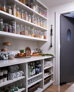 an organized pantry with lots of food and drinks