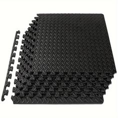 black rubber mats with holes for flooring