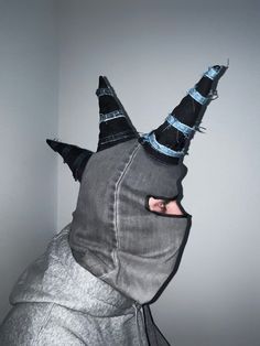 Denim Balaclava with 3 spikes made of repurposed denim.  Spikes are filled with used fabric scraps from previous projects.  Stripes around spikes are also collected from used jeans.  Unisex, one size Because there is used repurposed denim each balaclava will be a little different and unique. Send me a message if you wish it to be made of blue denim or black/grey denim Repurposed Denim, Mask Fashion, Face Mask Fashion, Grey Denim, Fabric Scraps, Moda Fashion, Black Grey, Black Denim, Caps Hats