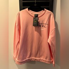 Nike -Just Do It -Salmon Pink Sweatshirt. Loose Fit- Brand New With Tags Nike Pink Long Sleeve Tops, Pink Nike Long Sleeve Tops, Pink Long Sleeve Nike Tops, Nike Pink Crew Neck Top, Sweaters Nike, Olive Green Nike, Nike Half Zip, Nike Crop Top, Nike Crew Neck