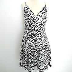 Brand New With Tag $59.95. Price Is Firm. Spotted White Dalmatian Spaghetti Strap Mini Dress By Express. Size: Medium Chic Leopard Print Mini Dress For Brunch, Leopard Print Sleeveless Mini Dress For Day Out, Sleeveless Leopard Print Mini Dress For Day Out, Summer Leopard Print Mini Dress For Brunch, Spring Leopard Print Mini Dress For Day Out, Casual Leopard Print Spaghetti Strap Dress, Casual Leopard Print Dress With Spaghetti Straps, Spotted Dress, Spaghetti Strap Mini Dress