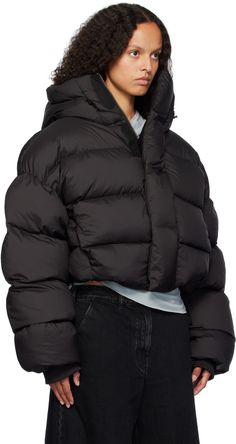 Down-filled quilted polyester taffeta puffer jacket. · Water-resistant DWR coating · Bungee-style drawstring at hood and hem · Funnel neck · Zip closure with velcro placket · Cropped hem · Seam pockets · Dropped shoulders · Inset rib-knit cuffs · Zip pocket at interior · Fully lined Supplier color: Pupil Fill: 90% duck down, 10% duck feather. Black Down Puffer Jacket With Drawstring Hood, Quilted Hooded Duck Down Puffer Jacket, Quilted Duck Down Hooded Puffer Jacket, Black Nylon Puffer Jacket With Drawstring Hood, Sporty Hooded Duck Down Puffer Jacket, Outdoor Puffer Jacket With Drawstring Hood, Streetwear Duck Down Puffer Jacket With Double-lined Hood, Streetwear Duck Down Puffer Jacket With Detachable Hood, Duck Down Puffer Jacket With Detachable Hood For Streetwear