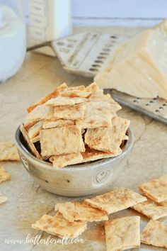 some crackers are in a bowl on a table