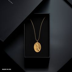 PENDANT INFORMATIONThis pendant is made of real, solid gold.• Made in USA• Material: 14k or 18k solid gold• Finish: polished• Height: 1.25" (31,5 mm) x Width: 0.85" (21 mm)• Pendant weight: approx. 6 grams (14k)• Bail: fits up to 4 mm chains• Solid back, not hollow• A certificate of authenticity is included• Delivered in our elegant jewelry box, making it the perfect gift Shipping: All of our orders are custom-made. Please allow approximately 3 weeks for production and shipping. Shipping include Divine Protection, Solid Gold Chains, Mini Pendants, Patron Saints, Memento Mori, The Divine, Elegant Jewelry, Gold Finish, Gold Chains