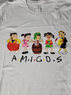 This white t-shirt is a must-have for fans of the classic El Chavo show. The shirt features a design of El Chavo and his friends, making it a great addition to any fan's wardrobe. The size of the shirt is L, which is a comfortable fit for most people. The color of the shirt is white, which is a classic color that can be easily paired with other clothing items. The design of the t-shirt is a classic show, which is a reference to the popular Mexican cartoon series El Chavo. The design is eye-catching and will surely draw attention from fellow fans. The shirt is perfect for wearing to conventions or other events where fans of the show come together. Overall, this white t-shirt is a great way to show your love for the classic El Chavo show. The design is unique and will surely make you stand o Cartoons Series, White Tshirt, Must Haves, Clothing Items, Overalls, Comfort Fit, Gender Neutral, Tops & Tees, Adult Outfits