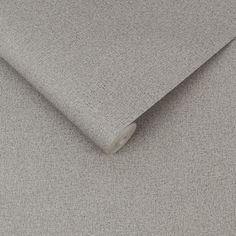 a close up view of the fabric on a plain grey shirting material that is very soft