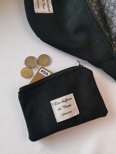 Black corduroy coin purse with zipper. It can be matched with the banana available in the store. It is a good size, you can put your change, credit card and ID or your makeup in it. It also has a black and white cotton lining (may be different from photo) and a zipper. Dimensions: width 14cm, height 10cm * It will be sent to you in tissue paper, in a bubble envelope and by tracked mail ** All my items are handmade by myself in my workshop located in Val d'Oise Black Coin Purse With Zipper Pocket, Black Coin Purse With Zipper Pocket As A Gift, Black Casual Coin Purse For Daily Use, Casual Black Coin Purse For Daily Use, Trendy Black Coin Purse For Personal Use, Casual Black Pouch For Gift, Bubble Envelopes, Coin Purses, Purse Pouch