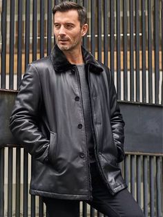 Men's Double Sided Fur Shearling Leather Coat In Black Our men's double-sided fur shearling leather coat will enhance your winter wardrobe. Crafted from genuine sheepskin leather with a semi-aniline finish and faux shearling lining, this double-sided jacket showcases rich black fur. The classic turn-down collar, button closure, and practical pockets make it a timeless blend of warmth and style. Stay cozy and sophisticated in classic black. Outer Shell: Real Leather Leather Type: Sheepskin Leathe Black Fitted Sheepskin Leather Jacket, Luxury Long Sleeve Sheepskin Leather Jacket, Men’s Fur Coat, Luxury Leather Fur Coat For Men, Luxury Black Shearling Leather Jacket, Leather Shorts Women, Short Leather Skirts, Leather Jumpsuit, Shearling Vest