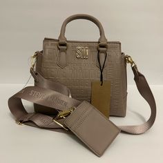 New Steve Madden Crossbody Purse. Original Tag Mushroom Bjaylin. Color Nude. Includes Strap And Card/Id Holder. Original Tags On Purse. Last Picture Is With Flash. Steve Madden Purse Handbags, Girly Items, Pink Coach Purses, Pretty Tote Bags, Trendy Purses, Steve Madden Purse, Baddie Tips, Card Id, Girly Bags