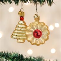 two ornaments hanging from a christmas tree