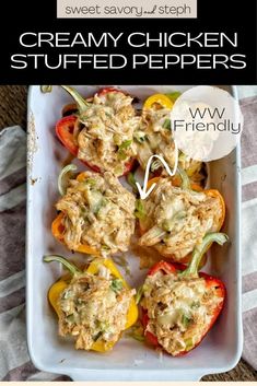 an image of stuffed peppers with creamy chicken in the middle on a white plate and text overlay that reads, creamy chicken stuffed peppers