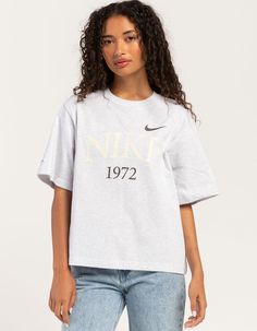 Nike Sportswear Classic Boxy Tee. 1972, The Year We Launched The First Nike Shoe, Serves As A Reminder Of The Past As You Reach Towards The Future. Heavyweight Cotton Gives You A Structured And Premium Feel, While The Boxy Fit And Dropped Shoulder Seams Create A Relaxed Look Without Feeling Too Big. Classic And Timeless—this Tee Does It All. 100% Cotton. Machine Wash. Imported. Model Is Wearing A Size Small. Model Measurements:height: 5'6" Bust: 30"waist: 25.5"hips: 36.5" Baggy Shirt, Flannel Sweatshirt, Nike Shoe, School Clothes, Boxy Tee, Gym Clothes, Nike Sweatshirts, School Shopping, Top Graphic Tees