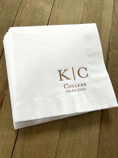 the personalized napkins are on top of each other