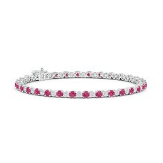 Pink sapphires and brilliant diamonds are alternately set on this alluring 14k white gold tennis bracelet. The round diamonds are held in an illusion gypsy setting. Gold Tennis Bracelet, Diamond Tennis Bracelet, Sapphire Bracelet, Tennis Bracelet Diamond, Pink Bracelet, Brilliant Diamond, Tennis Bracelet, Pink Sapphire, Rope Bracelet