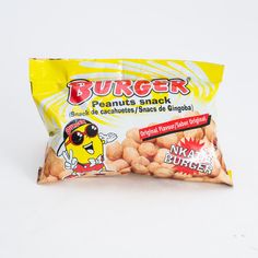 a bag of burger peanuts sitting on top of a white table