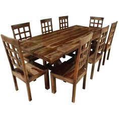 a wooden dining table with six chairs and one chair missing the back end is shown