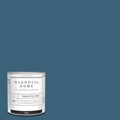 a can of blue paint with the words magnolia home on it's front and side