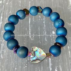 I am happy to offer personalized, custom bracelets that are made for your personal healing needs. Is there a particular gemstone or crystal that you are looking for to achieve your healing needs? If so, let me know! Not sure where to start? Order a Wellness Session and let's ask your Higher-Self which crystals would be in your highest and best good for healing. How to order Choose the primary gemstone or crystal you would like to be the main stone of the bracelet. Choose a secondary gemstone or Spiritual Iridescent Jewelry With 8mm Beads, Adjustable Iridescent Jewelry With 8mm Beads, Adjustable Heart-shaped Spiritual Bracelets, Iridescent Gemstone Beads Jewelry As Gift, Iridescent Gemstone Beads Jewelry For Gift, Hypoallergenic Adjustable Agate Jewelry, Blue Personalized Spiritual Bracelets, Adjustable Hypoallergenic Agate Jewelry, Spiritual Personalized Turquoise Jewelry