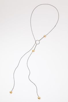 Murano Glass Lariat by Morgan Amirani (Gold, Silver & Stone Necklace) | Artful Home Luxury Lariat Sterling Silver Necklace, Luxury Sterling Silver Lariat Jewelry, Modern Polished Beads Necklace For Gift, Luxury Yellow Gold Jewelry With Faceted Beads, Elegant Metal Necklaces With Polished Beads, Modern Gold Long Drop Necklace, Modern Adjustable Jewelry With Polished Beads, Modern Metal Lariat Jewelry, Elegant Beaded Lariat Jewelry