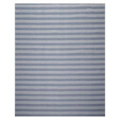 a blue and white striped rug