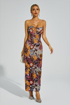 Elevate your style with the Leanna Red Flower Embroidered Maxi Dress. This stunning dress features a figure-hugging silhouette and exquisite flower embroidery. Designed in a mesmerizing shade of blue, it exudes sensuality and sophistication. With its floor-length design and sleeveless cut, it is perfect for any formal occasion. Make a statement and feel luxurious in this gorgeous attire.  Dress Length: Approx 128cm Materials: Polyester Gentle Dry Clean Only  The model is 5 ft 7 and wears size S Svecane Haljine, Glitter Wedding Dress, Hugging Silhouette, Bandage Midi Dress, Embroidered Maxi Dress, Floral Shirt Dress, Puff Sleeve Dresses