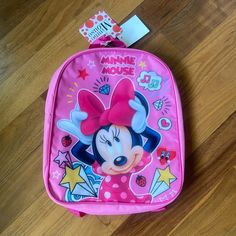 This Minnie Mouse Backpack Is The Perfect Size For Toddlers And Young Children. It Features Fully Adjustable Shoulder Straps To Provide Your Gild With The Perfect Fit And Also A Loop Carry Handle Pf/Sf Home See Minnie Mouse Lunchbox For Bundling! Disney Mickey Mouse Backpack For School, Disney Minnie Mouse Backpack, Pink Minnie Mouse Backpack For Disney Trips, Disney Minnie Mouse Standard Backpack, Pink Minnie Mouse Standard Backpack, Minnie Mouse Standard Backpack For School, Minnie Mouse Standard School Backpack, Cute Minnie Mouse Backpack For School, Minnie Mouse Backpack For Back To School