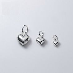 8-14mm Sterling Silver Heart Pendants , 925 Silver Charms Wholesale / TGF-s0590 Material: 925 sterling silver Color: silver Size: 8*6*3.5mm(small) 11*9*5mm(middle) 14*9*5mm(big) Quantity: 1 piece Welcome to our shop: https://www.etsy.com/shop/ClareAccessories Puffy Heart Charms, Sterling Silver Heart Pendant, Romantic Jewellery, 925 Silver Bracelet, Silver Heart Pendant, Puffy Heart, Valentines Necklace, Accessories Diy Jewelry, Diy Charms