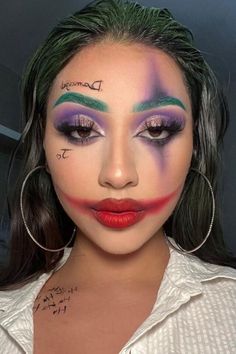 Joker has always managed to steal the show with his wide smile. This sassy Halloween makeup is perfect for the day. You can play with such a colorful palette. Green thick eyebrows, mismatching eye shades, and the most screaming red lips will set you up for the day. //photocredit: @glambygladyss Spooky Makeup, Wide Smile, Halloween Aesthetics, Palette Green, Makeup You Need, Joker Makeup, Red Lip Makeup, Colorful Palette