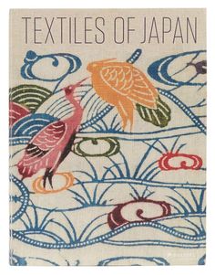 a book with an image of two birds on the cover and text that reads textiles of japan