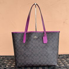 New With Tag Coach City Tote Bag Signature Brown Dark Magenta Retail: $398.00 100% Authentic Snap Closure Pvc Leather Coach Logo At Front Gold Toned Hardware Zip Pocket Interior Approximate Measurement: 17"(Top) 12"(Bottom)(L) X11"(H)X 6"(D) Double Handle: 10" Drop Very Clean, Smoke & Pet Free Environment Luxury Purple Bags With Double Handle, Luxury Purple Double Handle Bag, Luxury Purple Tote Shoulder Bag, Purple Rectangular Bag With Dust Bag, Purple Rectangular Bag, Large Capacity Purple Shoulder Bag For On-the-go, Luxury Purple Tote Bag, Luxury Purple Bags For Everyday Use, Luxury Everyday Purple Bags