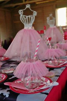 pink tulle skirted tablecloths and plates with candy canes on them