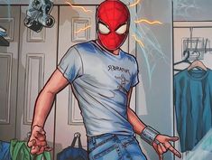 a man in a white shirt and blue jeans with a spider - man mask on